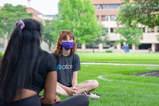 Aug. 2: Sarah Cawley, an SU freshman, spends her allotted outdoor time sitting in a social distancing circle on the Quad, talking with the students in her pod. Some freshmen arrived on campus in early August to quarantine before the start of the fall semester.