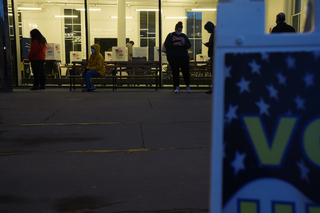 Nov. 3: Voters line up outside Huntington Hall as they wait for poll workers to fix a broken ballot printer. Thousands of SU and Syracuse community members voted at local polling places in the 2020 presidential election.